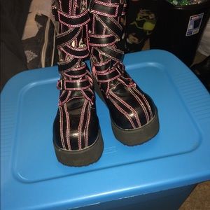 Black with pink stitching Demonia platform boots